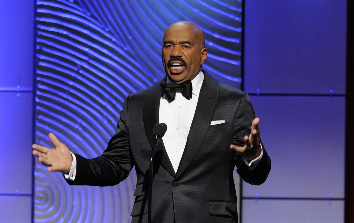 FILE - In this June 16, 2013 file photo, Steve Harvey speaks on stage at th...